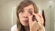 beautiful blonde girl eyeliner application