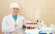 male nurse works with blood sample