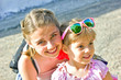 Two girls standing together and smiling