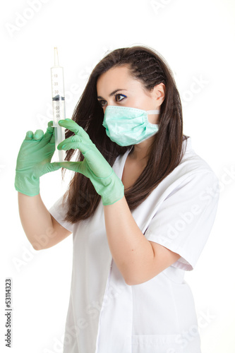 Photo: Doctor woman with medical syringe. young female doctor with syri Doctor woman with medical syringe. young female doctor with syri