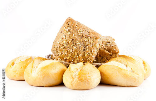 Photo: Bread on a white background. delicious buns isolated on white Bread on a white background. delicious buns isolated on white