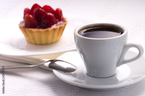 Photo: Whie Cup of Black Coffee with Strawberry Dessert Whie Cup of Black Coffee with Strawberry Dessert
