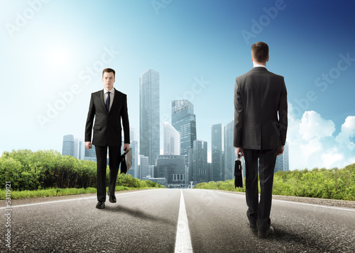 Photo: two business men on the road two business men on the road