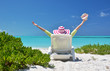 Girl with a shell on the sunbed looking to the ocean. Exuma, Bah