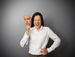 woman hiding her anger behind the mask