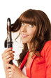 beautiful woman curling her hair