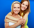 Closeup portrait of two women smiling