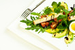 fresh green salad with avocado, tomato and egg
