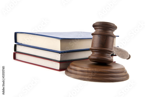 Photo: a wooden mallet and a book a wooden mallet and a book