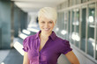 Photo: happy businesswoman looking and smiling at camera happy businesswoman looking and smiling at camera