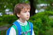 Portrait of serious student with backpack