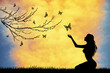 Girl gets butterflies at sunset