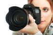 Beautiful young woman with camera.
