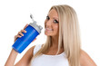 Happy woman with sports nutrition.