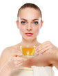 portrait of a beautiful woman drinking tea