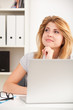 woman sitting at desk