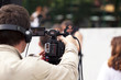 Photo: covering an event with a video camera covering an event with a video camera