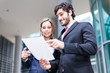 Business people reading a document