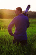Photographer in sunset
