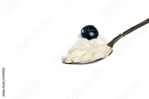 Photo: Whipped cream with a blueberry Whipped cream with a blueberry