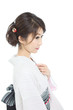 Photo: Beautiful young woman wearing japanese traditional kimono Beautiful young woman wearing japanese traditional kimono
