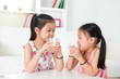 Photo: Children drinking milk. Children drinking milk.