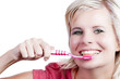 Foto: Attractive blonde girl with tooth care. Attractive blonde girl with tooth care.