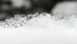 Photo: Snowflake in white snow Snowflake in white snow