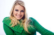 Portrait of a blond woman smiling at camera