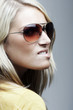 Portrait of a blond woman with sunglasses