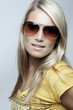 Beauty portrait of a blond woman with sunglasses