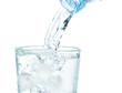 In a glass with ice flowing clean water. On a white background.