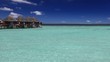 Island in ocean, overwater villas