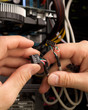 Photo: Connecting hardware parts of PC Connecting hardware parts of PC