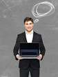 Photo: happy businessman holds the laptop happy businessman holds the laptop