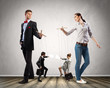 Businesspeople with marionettes