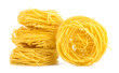 Italian egg pasta nest isolated on white background