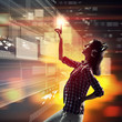 Woman touching virtual screen