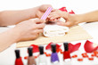 Woman is getting manicure
