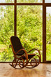 Rocking chair  near a large window