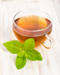 Foto: Kräutertee auf Holzbrett Kräutertee auf Holzbrett