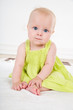 baby girl in green dress