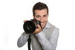 Portrait of photographer holding digital camera
