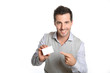 Handsome smiling man showing card