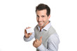 Handsome smiling man showing card with thumb up