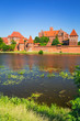 Malbork castle in summer scenery, Poland