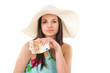 beautiful woman in summer dress with hat and money