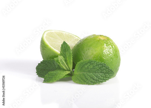 Photo: lime and a sprig of mint lime and a sprig of mint