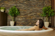 Young woman in the hot tub