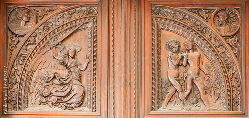 Photo: Madrid - Wooden relief expulsion of Adam and Eva Madrid - Wooden relief expulsion of Adam and Eva